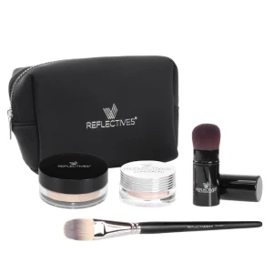 Im Mineral Basic-Set enthaltene Produkte aufgereiht vor Kosmetiktasche.